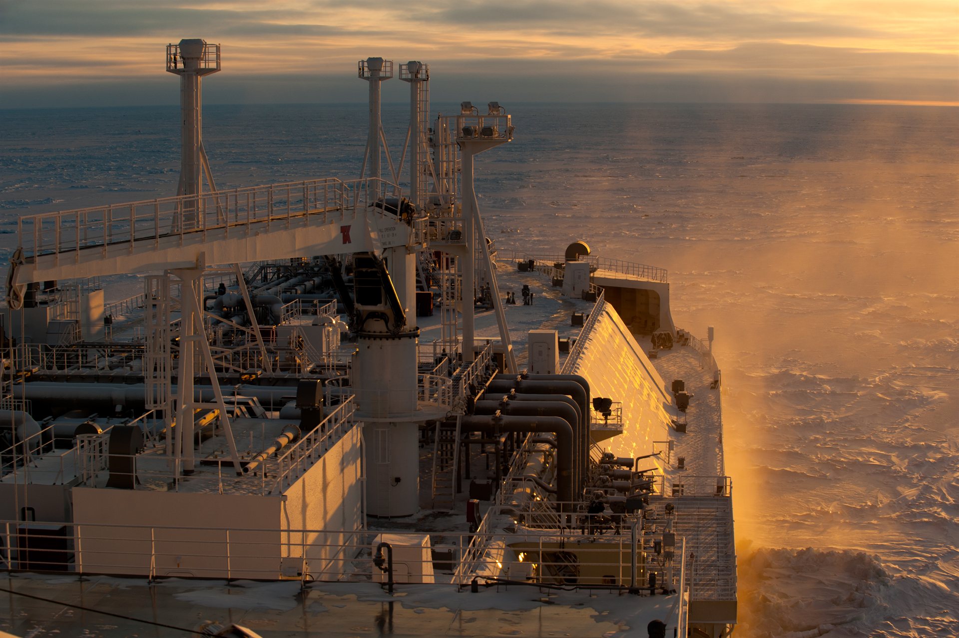 Harbor with vessels at sunset